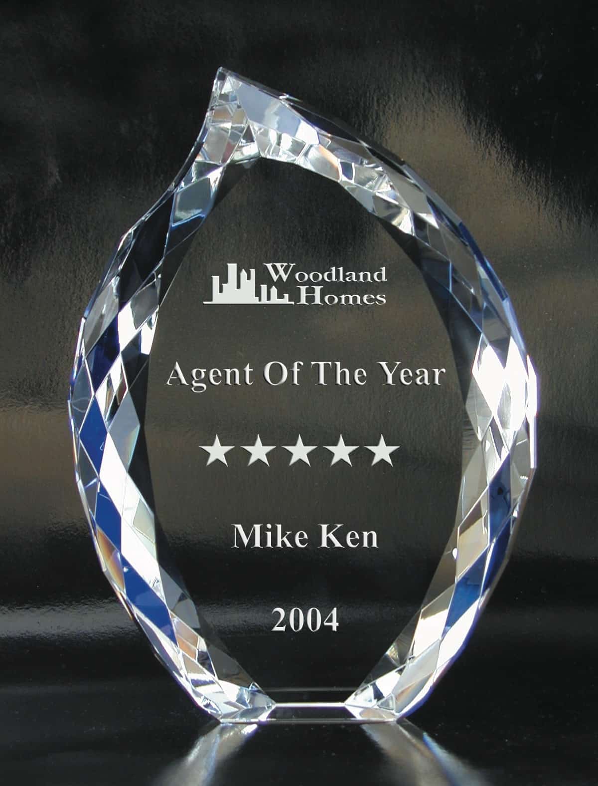 eternal flame crystal award customizable with texts and logos, great for corporate events and parties, real estate broker gifts
